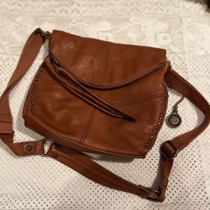 The sack sling bag crossbody brown leather gold hardware leather